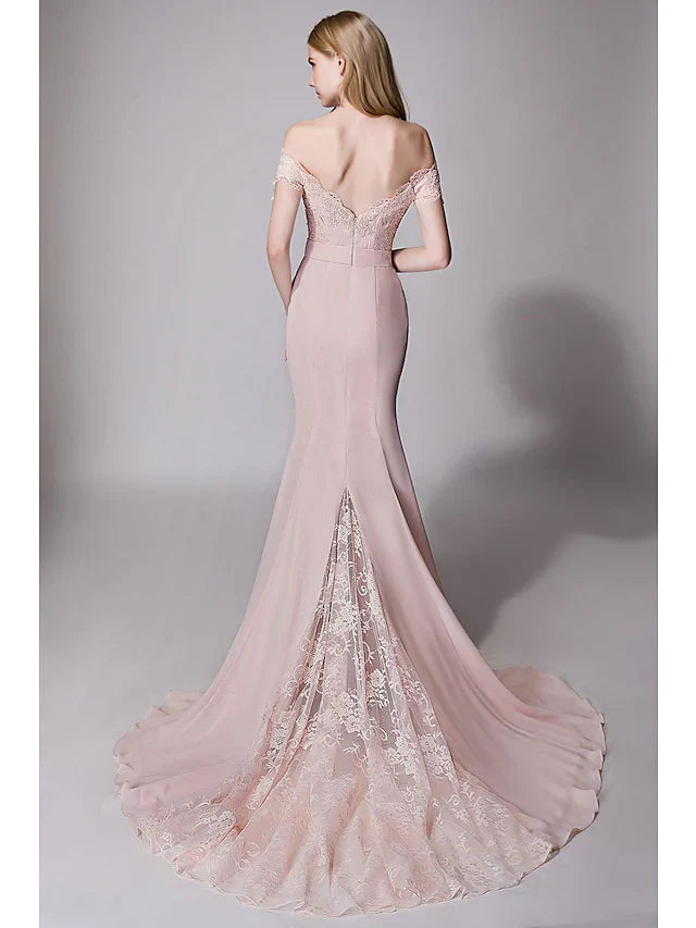 Back view of a soft blue sweetheart chiffon lace bridesmaid dress showing the court train.