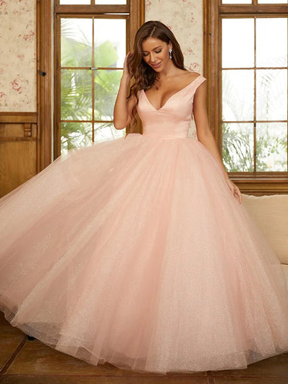 Back view of the light blue tulle ruffles ball gown with a flowing skirt.