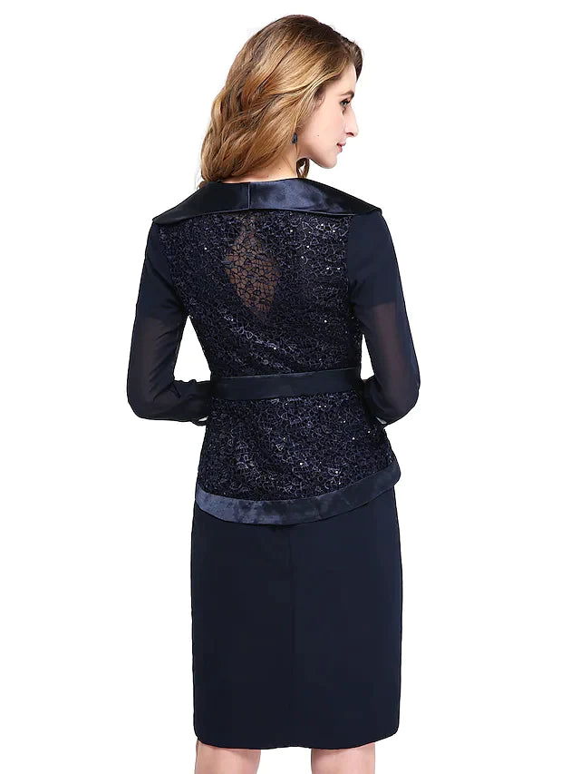 Model in motion, displaying the graceful drape of the chiffon lace two-piece dress.