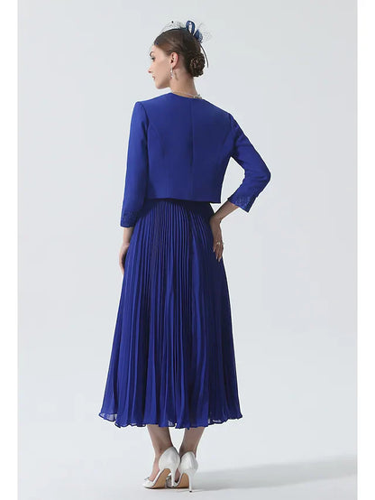 Side view of the tea-length chiffon mother of the bride dress, highlighting the flowy fabric.