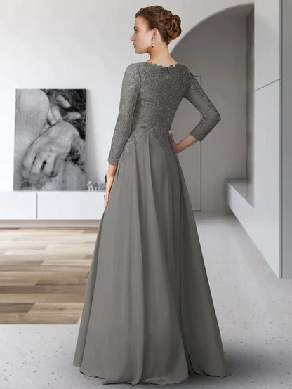 Close-up of the V-neckline and lace details on the 3/4 sleeve of the formal dress.