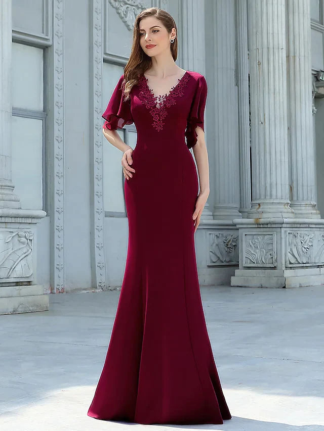 Back view of the floor-length chiffon bridesmaid dress with appliques.
