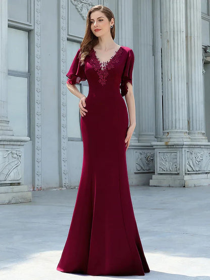 Back view of the floor-length chiffon bridesmaid dress with appliques.