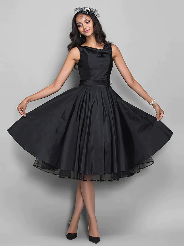 Model wearing an elegant V-neck ball gown cocktail dress with pleats and crystals.