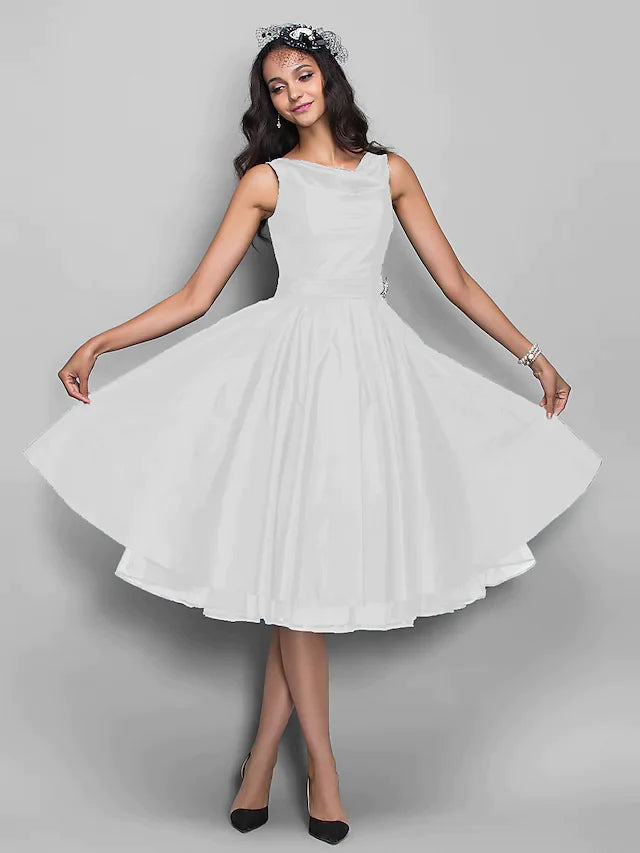 Side profile of a woman in a pleated V-neck party dress.