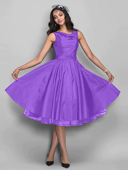 Full view of a knee-length prom dress, showcasing its elegant silhouette.