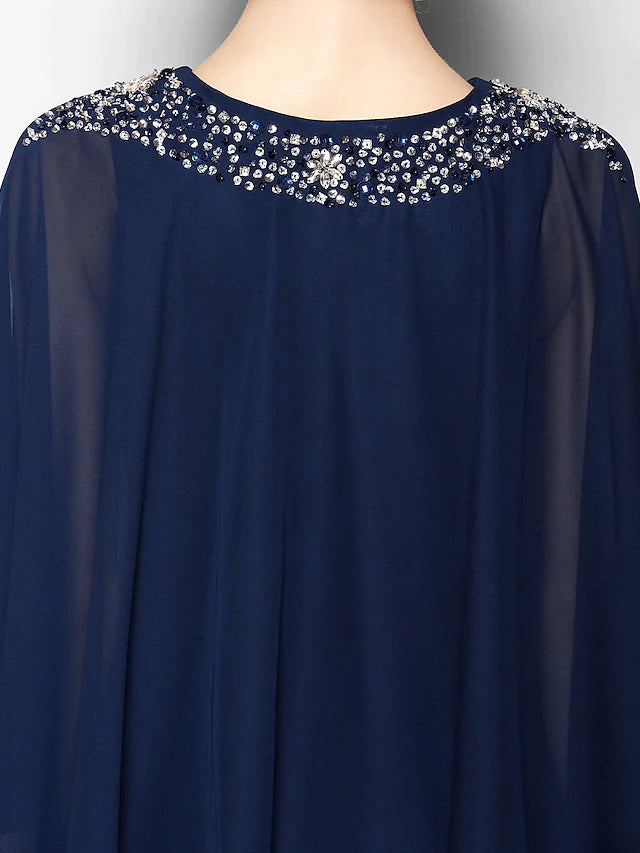Detail of the 3/4 length sleeve and the chiffon fabric of the elegant dress.