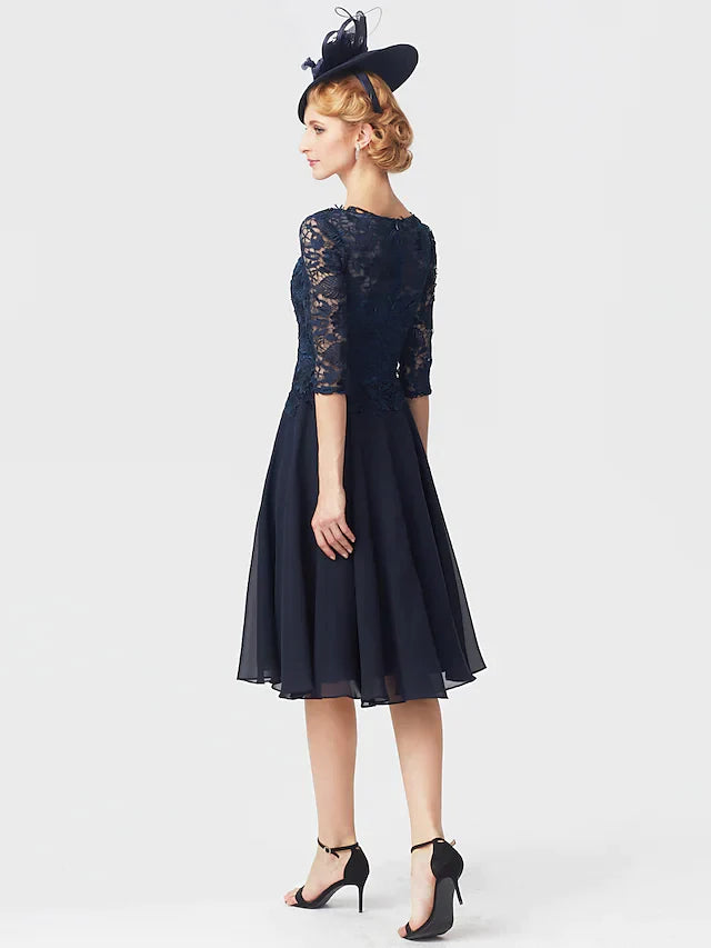 Side view of the knee-length chiffon dress with lace half sleeves.