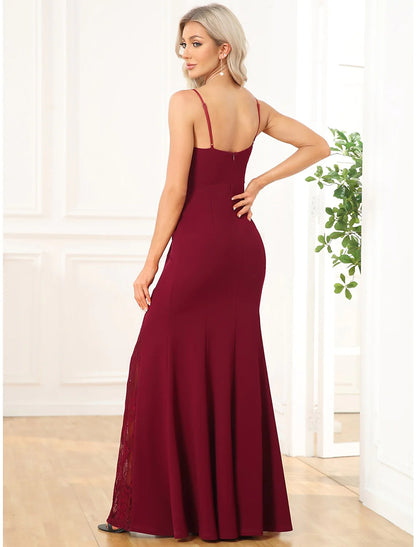 Back view of the mermaid trumpet evening gown showing embroidery detail.