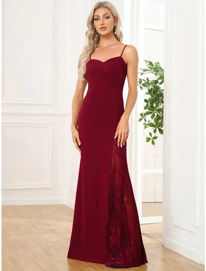 Close-up of the embroidered detail on the elegant evening gown.