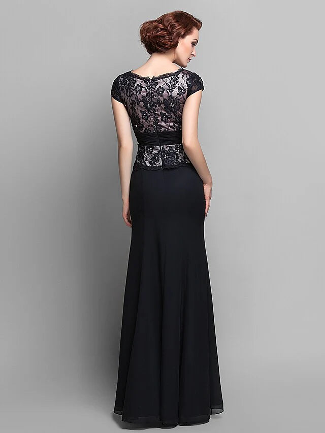 Side view of the Mother of the Bride dress, highlighting flowing chiffon and lace details.