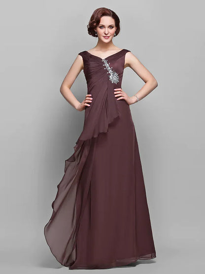 Model wearing an elegant A-line V-neck chiffon Mother of the Bride dress with ruffles and side draping.