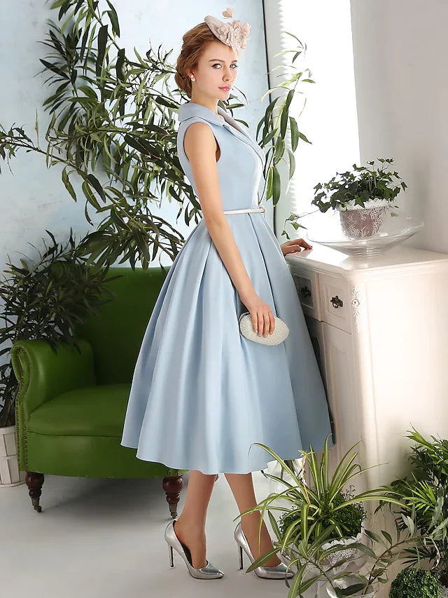 Back view of a woman in an A-line dress featuring a sash ribbon.