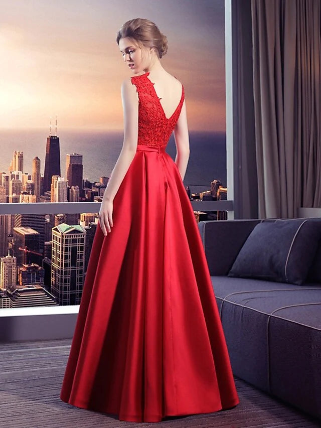 Side view of the ball gown wedding dress, highlighting delicate lace bows on the back.