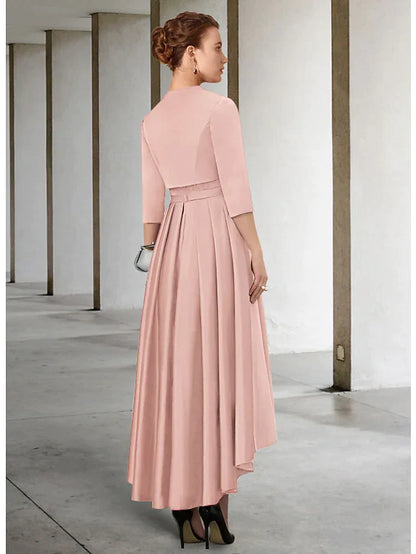 Side view of the teal mother of the bride dress, highlighting the 3/4 sleeves and pleated skirt.