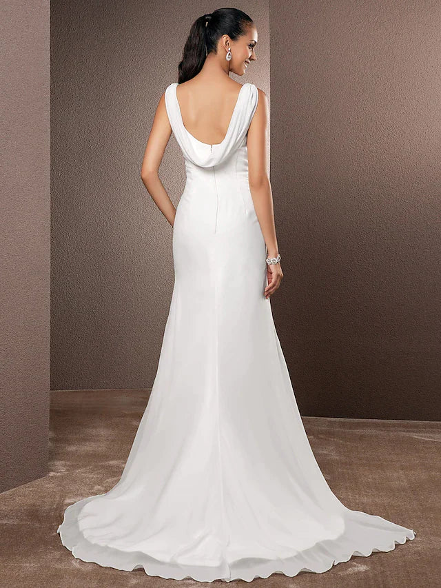 Back view of a vintage backless wedding dress, showing side draping.