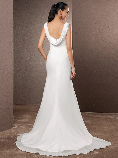 Back view of a vintage backless wedding dress, showing side draping.