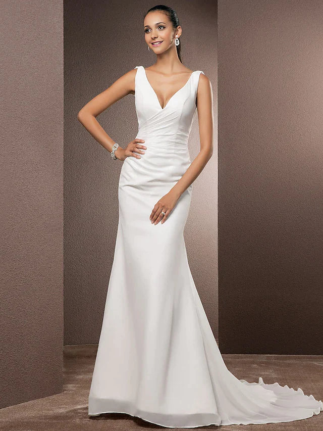 Full length view of an elegant bridal dress with regular straps.