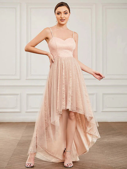 Close-up of the delicate lace detailing on the bodice and sweetheart neckline of the white dress.