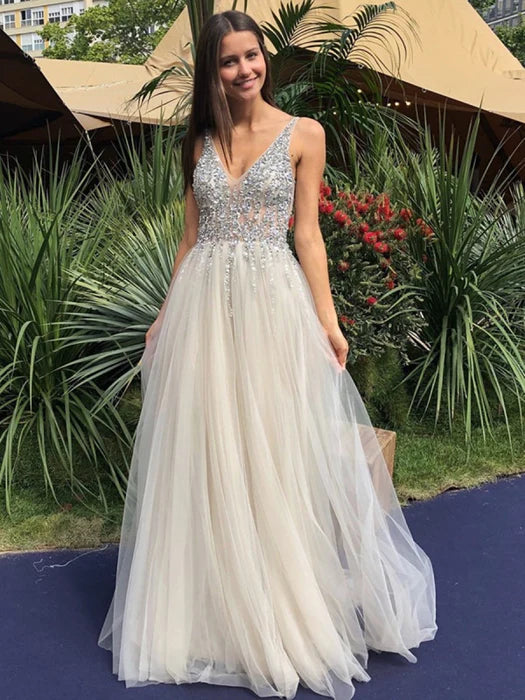 Elegant A-Line Deep V Sleeveless Beaded Champagne Prom Dress