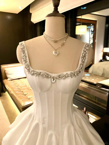 Elegant A-Line Square Neck Corset Beaded Satin White Mini Homecoming Dress