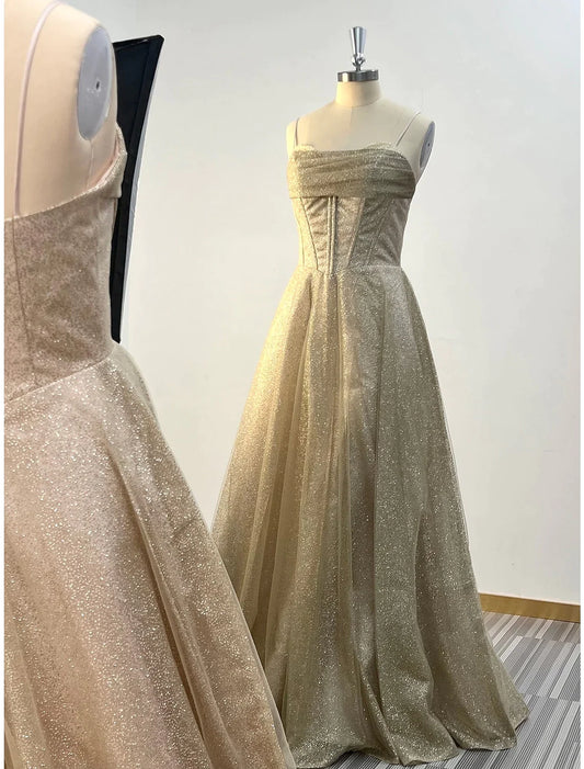 Model wearing a sparkling A-line cowl neck evening gown.