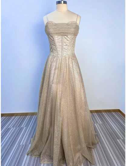 Close-up of the elegant cowl neck and corset bodice on a glitter tulle dress.