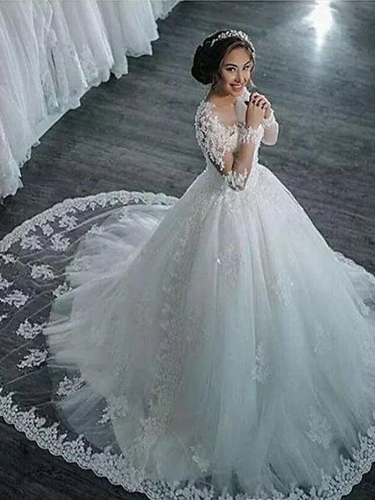 Front view of A-line wedding dress with high neck, lace long sleeves, and court train.