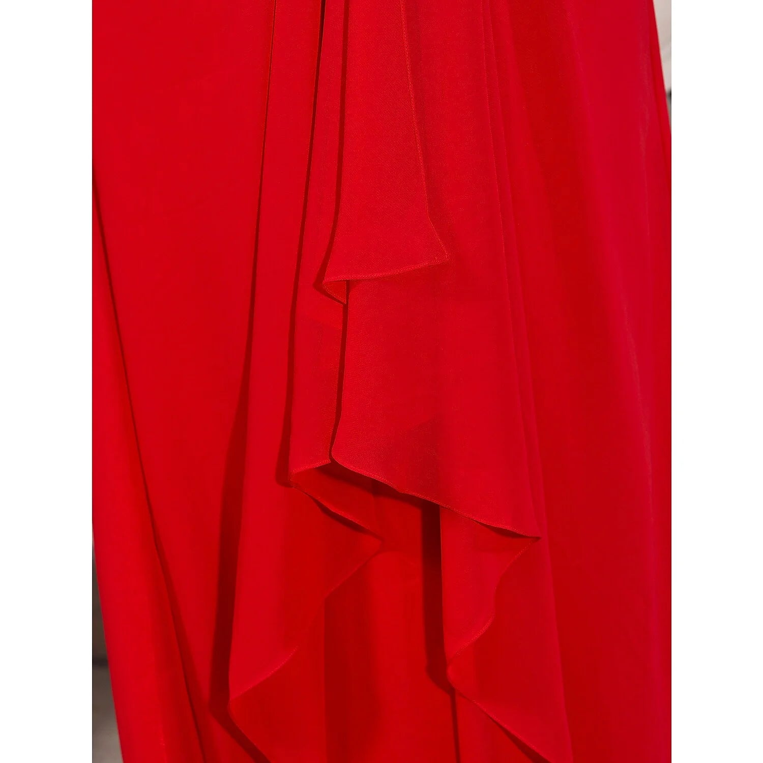 Detail of the plunging neckline and bodice of the beaded chiffon dress.