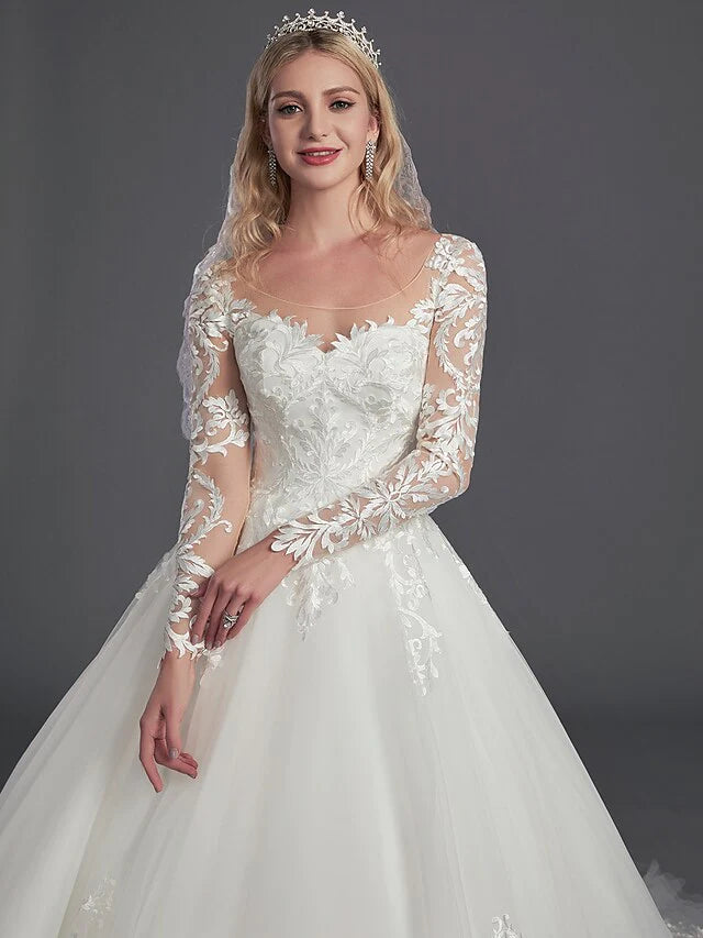 Full length view of the bride in the elegant ball gown wedding dress, ready for her special day.