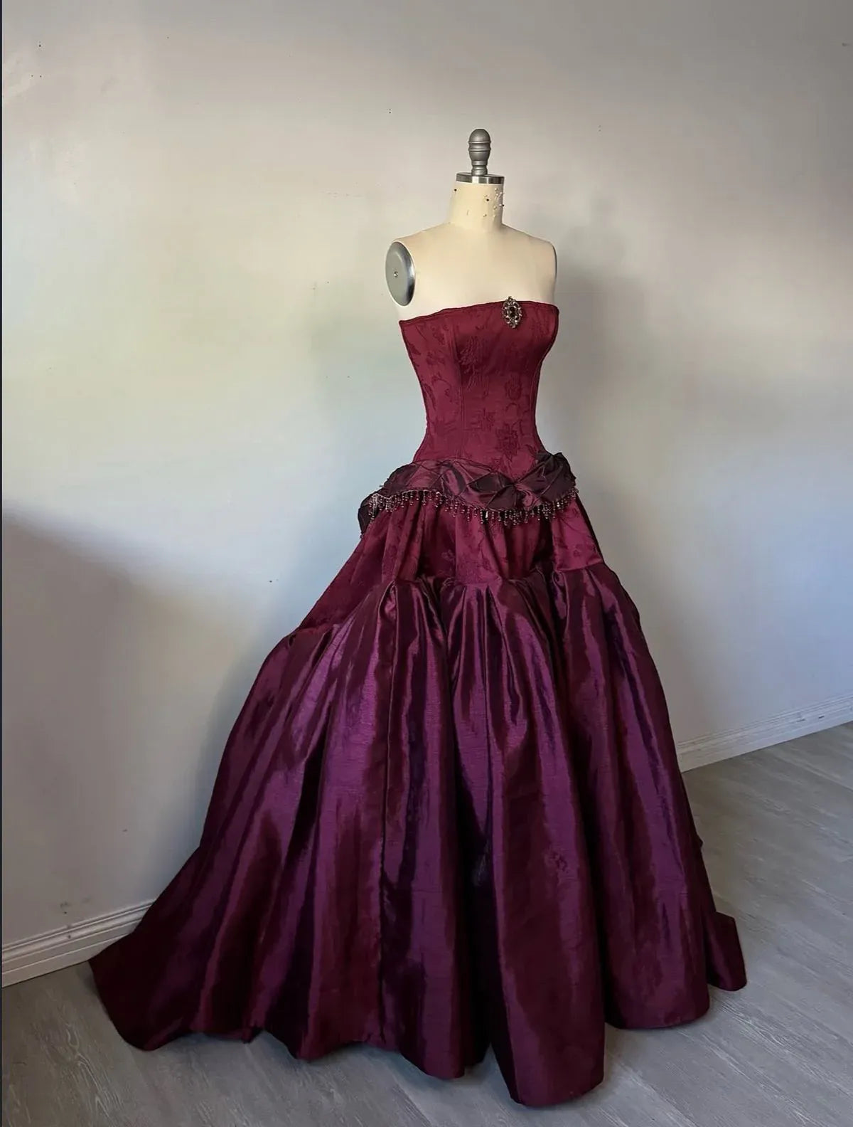 Glamorous Strapless Corset Bustle Satin A-Line Wedding Gown with Beading