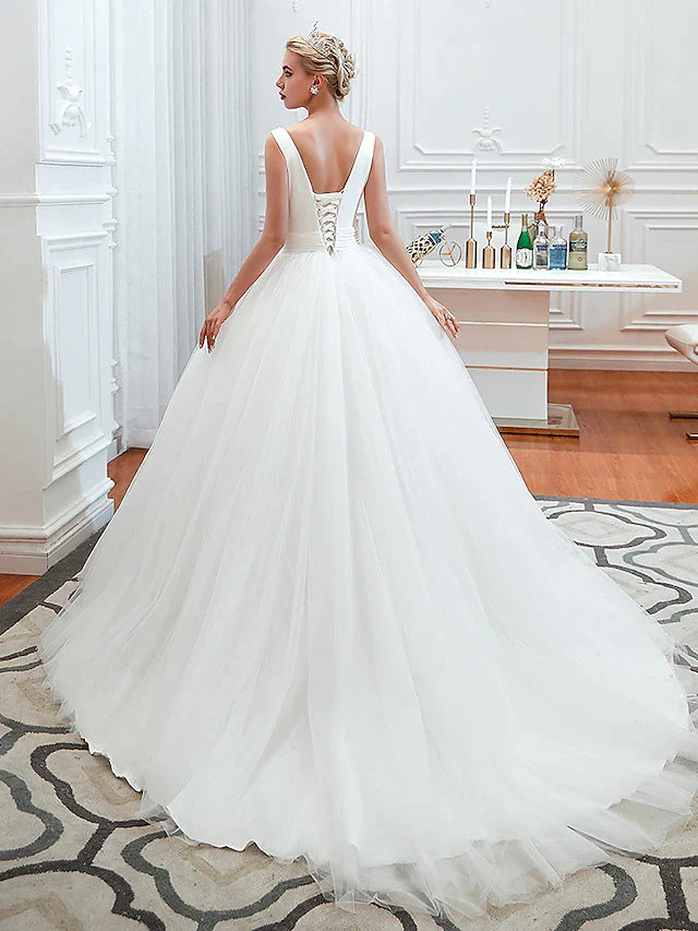 Side view of the ball gown wedding dress, highlighting the court train.
