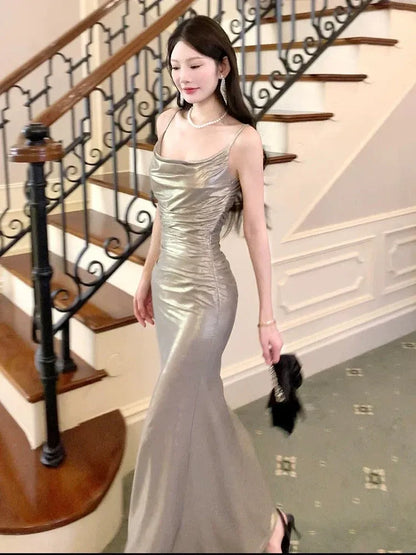 Glamorous Mermaid Cowl Neck Sleeveless Ruched Metallic Silver Maxi Prom Dress for Women Hot Sale