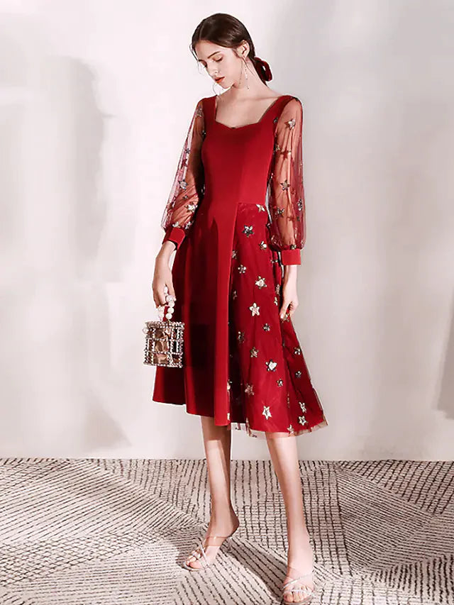 Side view of a woman in a tea length sequin A-line dress.