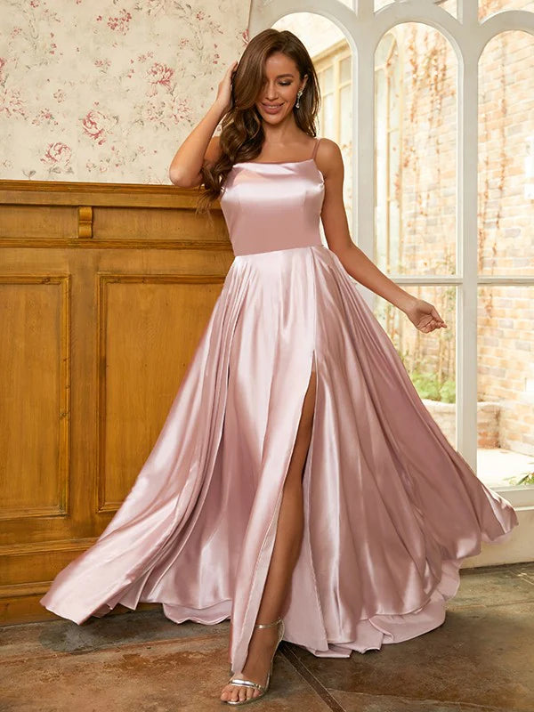 Elegant A-line prom dress in light blue silk-like satin with ruffles and spaghetti straps, front view.