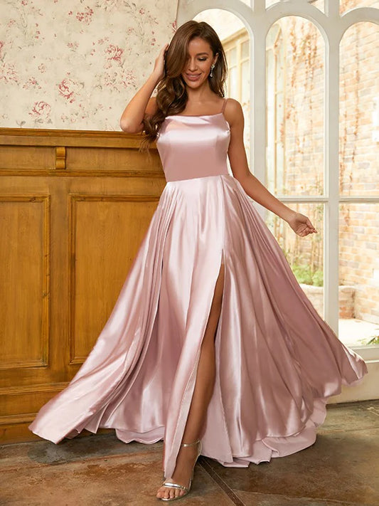 Elegant A-line prom dress in light blue silk-like satin with ruffles and spaghetti straps, front view.