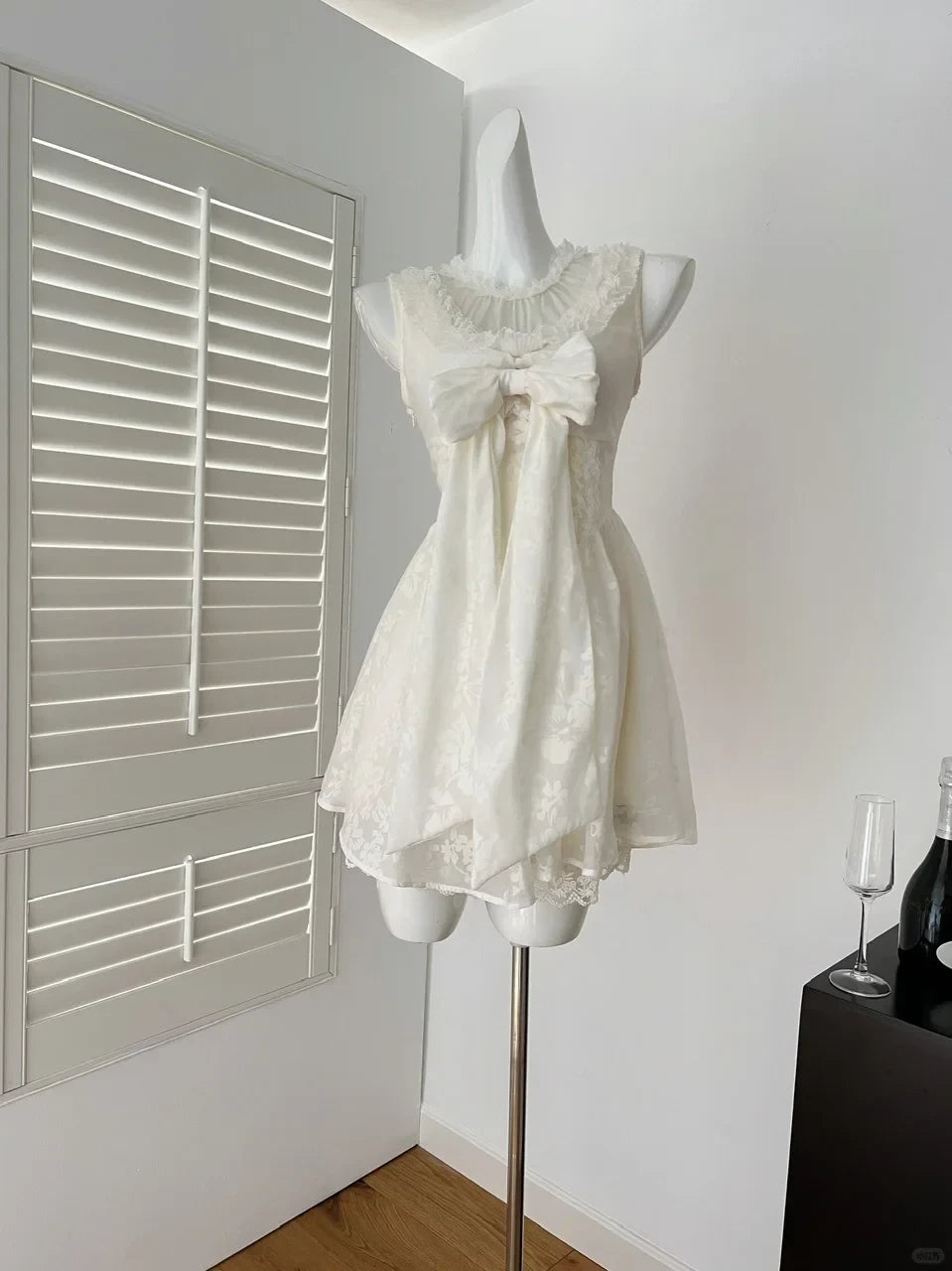 Lovely A-Line Round Neck Sleeveless Ruffled Bow-Accent Ivory Mini Homecoming Dresses