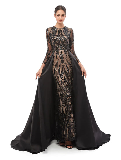 Model wearing a long sleeve jewel neck sequined mermaid trumpet dress.