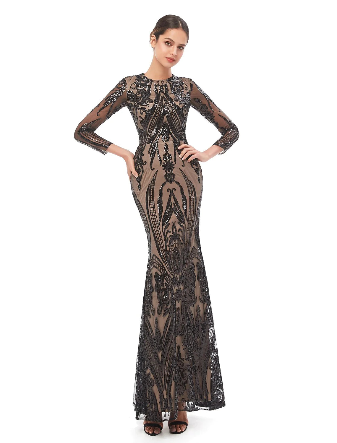 Back view of the luxurious mermaid trumpet dress with sequin details.