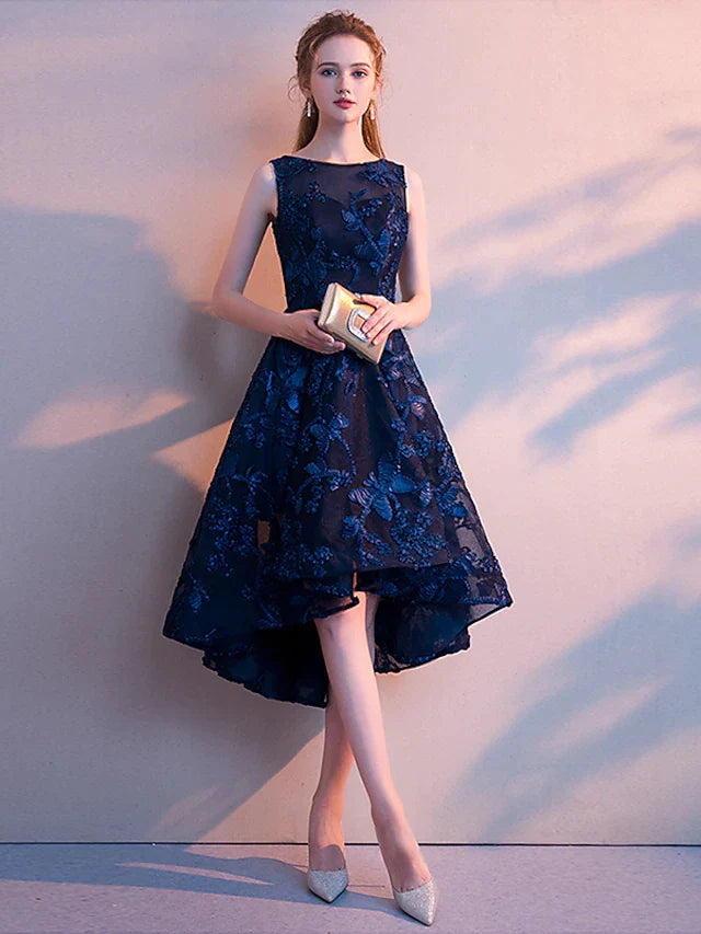 Full-length front view of a minimalist A-line cocktail dress with a jewel neckline.