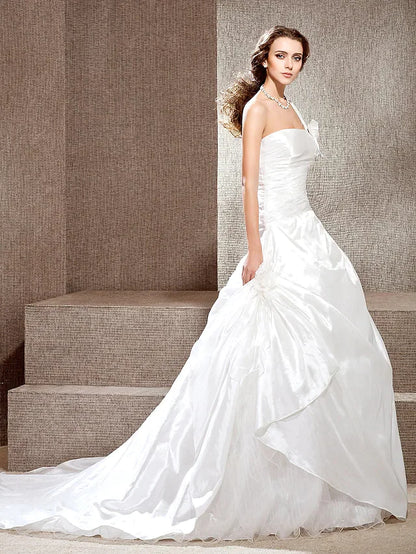 Full length view of the A-line wedding dress, emphasizing the flowing taffeta skirt.