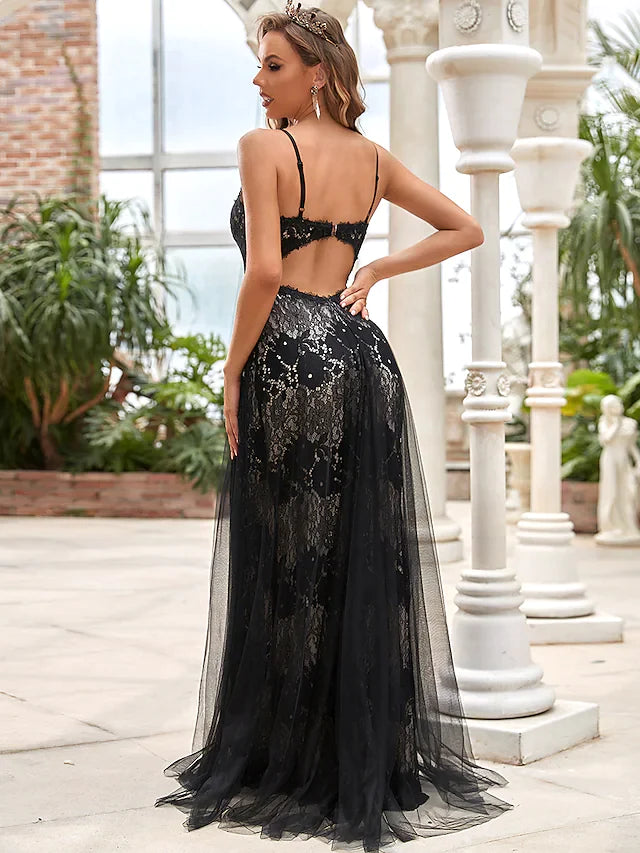 Close-up of the intricate lace and soft tulle fabric on the black A-line wedding dress.