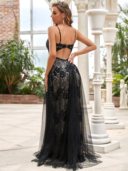 Close-up of the intricate lace and soft tulle fabric on the black A-line wedding dress.