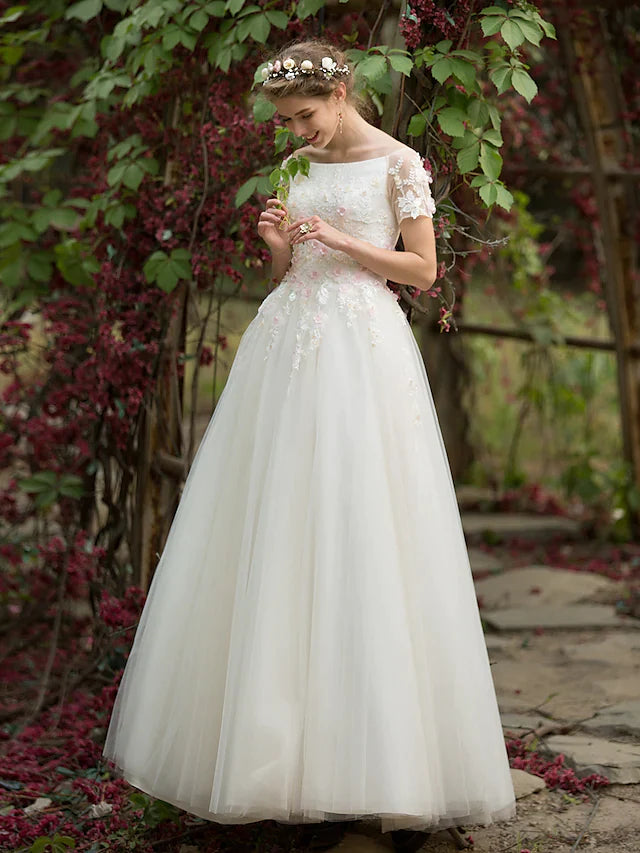 Side profile of a bride wearing the A-line tulle wedding dress.