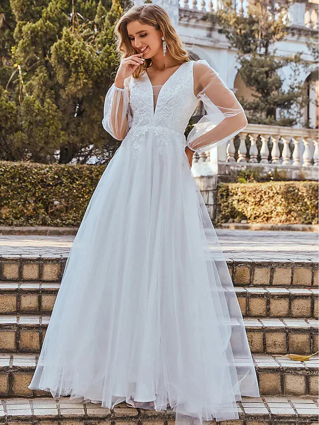 Back view of the elegant A-Line V-neck wedding gown.