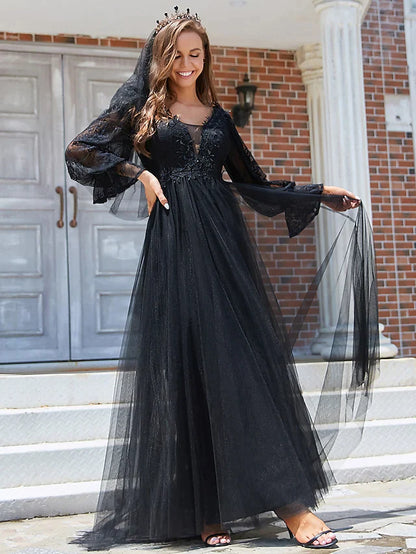 Back view of the black A-line wedding dress, showcasing the elegant train and A-line silhouette.