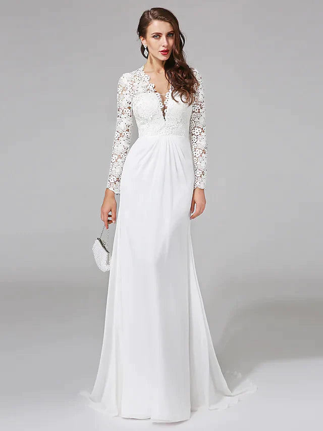 Model wearing a romantic boho V-neck chiffon wedding dress with floral lace long illusion sleeves.