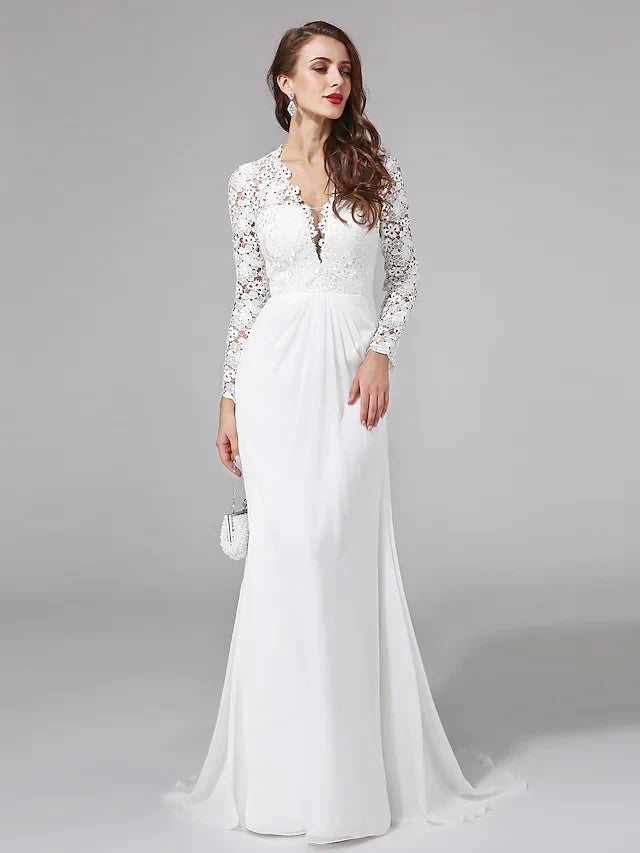 Back view of the boho wedding dress, showcasing delicate lace button details and a flowing chiffon skirt.
