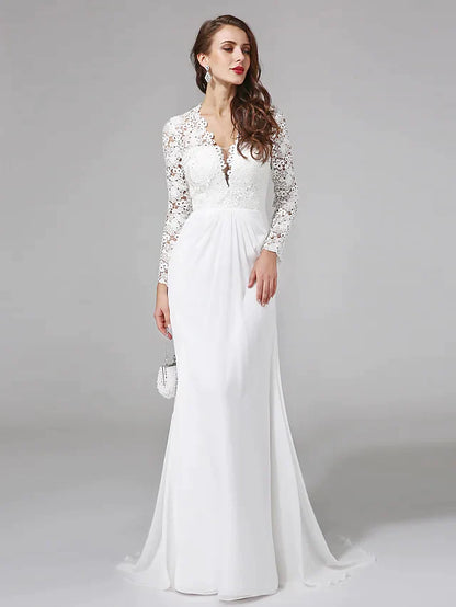 Back view of the boho wedding dress, showcasing delicate lace button details and a flowing chiffon skirt.