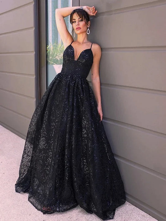 Full view of a shimmering blue A-line sequin prom dress with a V-neckline.